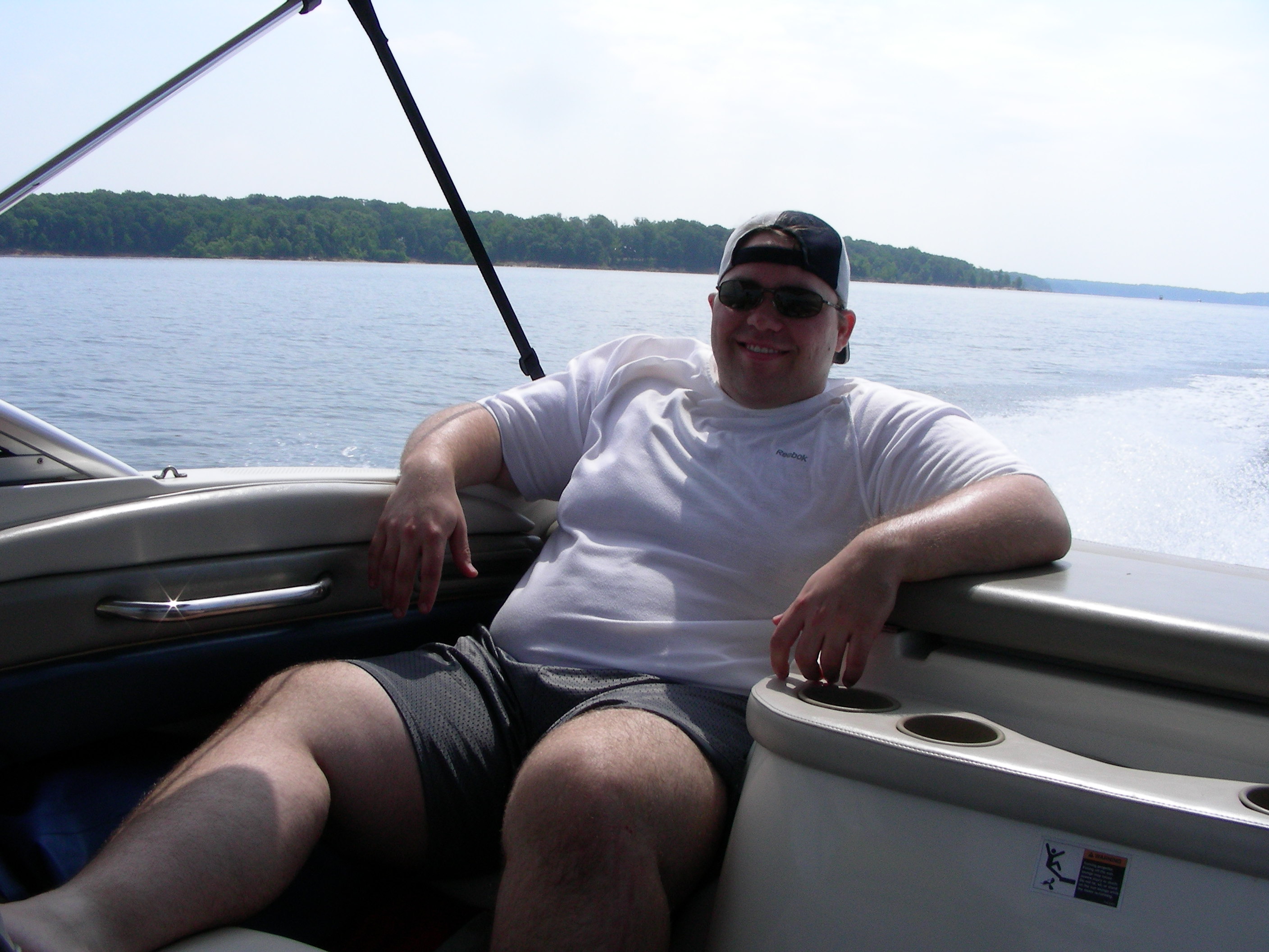 ./2010/Kerr Lake/Luis boating w guys 0007.JPG